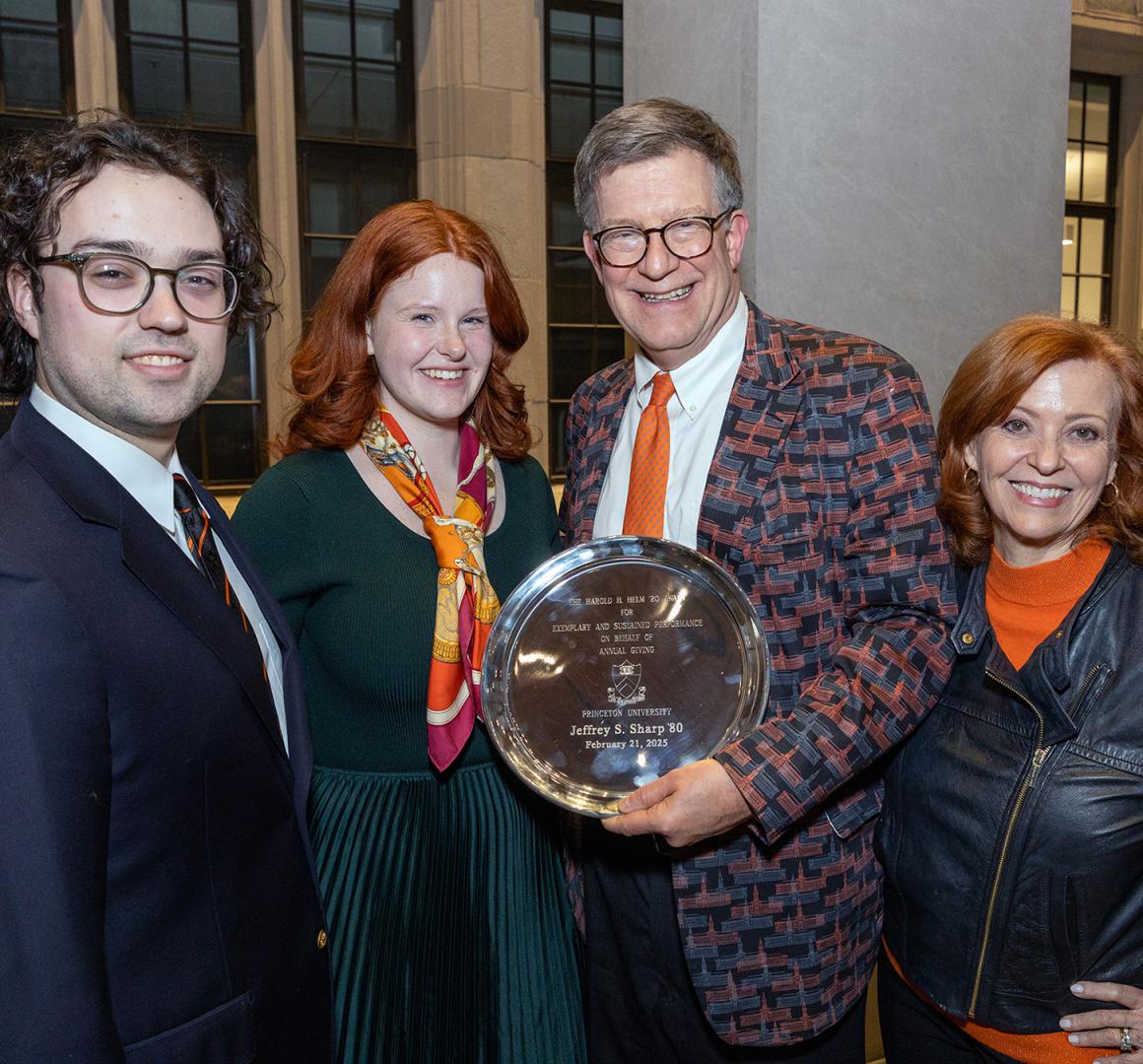 Jeff Sharp and his family posing with Helm Award