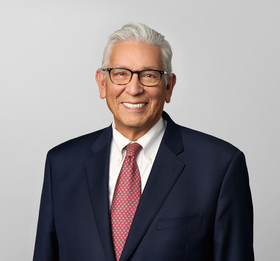 headshot of Kevin Gover wearing a suit and tie