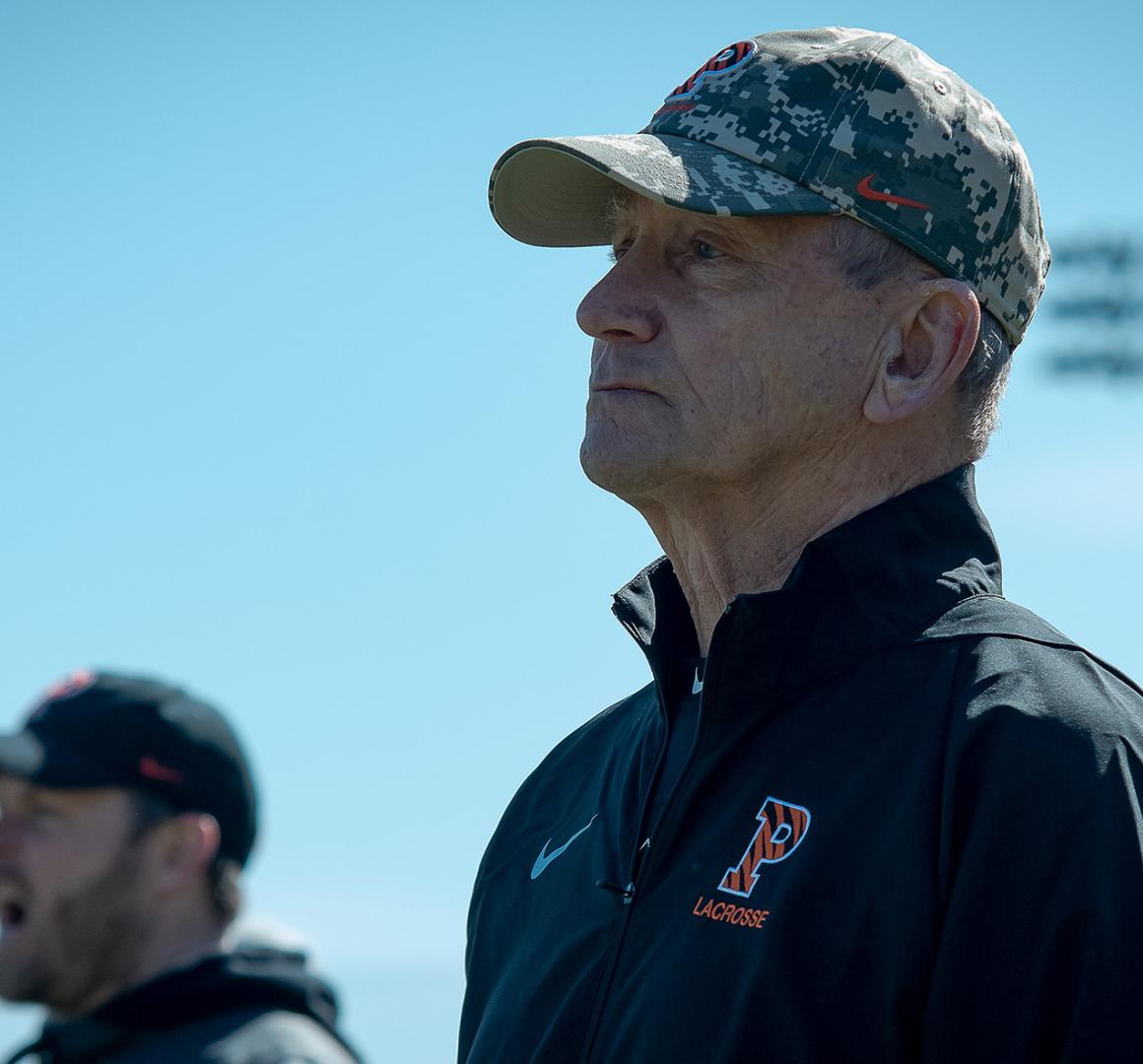 Chase Bryce coaching from the men's lacrosse sideline