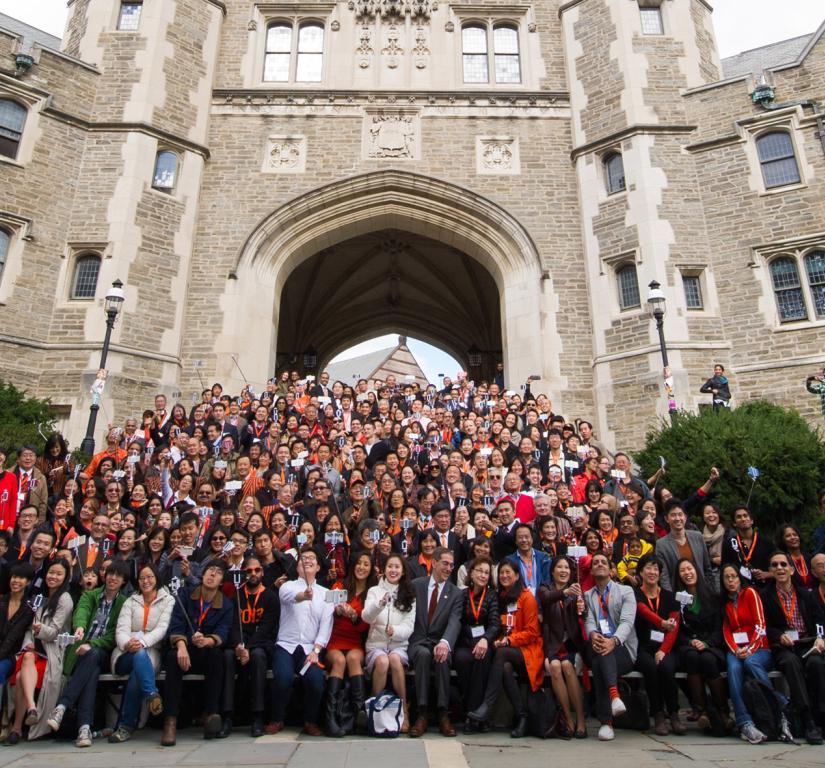 A group photo from the 2015 We Flourish conference with hundreds of Asian alumni on the steps of Blair Arch.