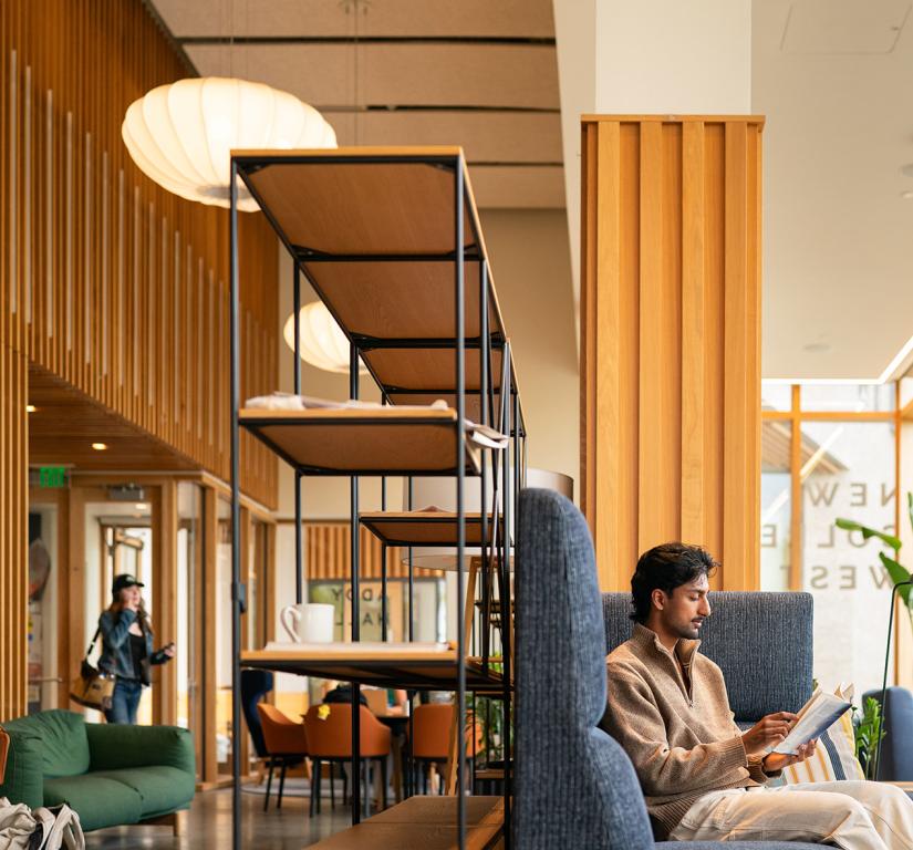 Students read quietly in one of the common spaces of Huo College