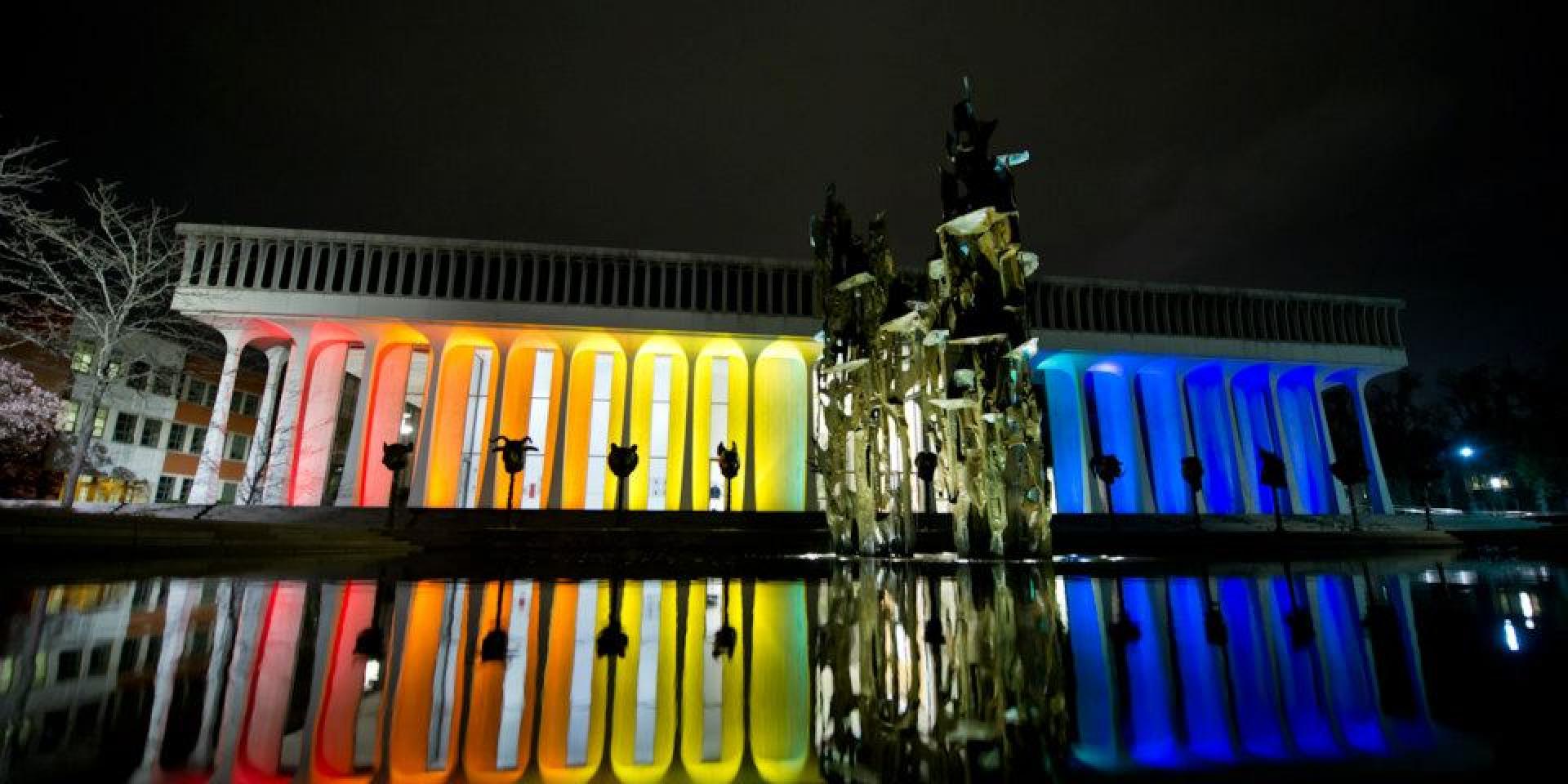 Building lit up in rainbow colors