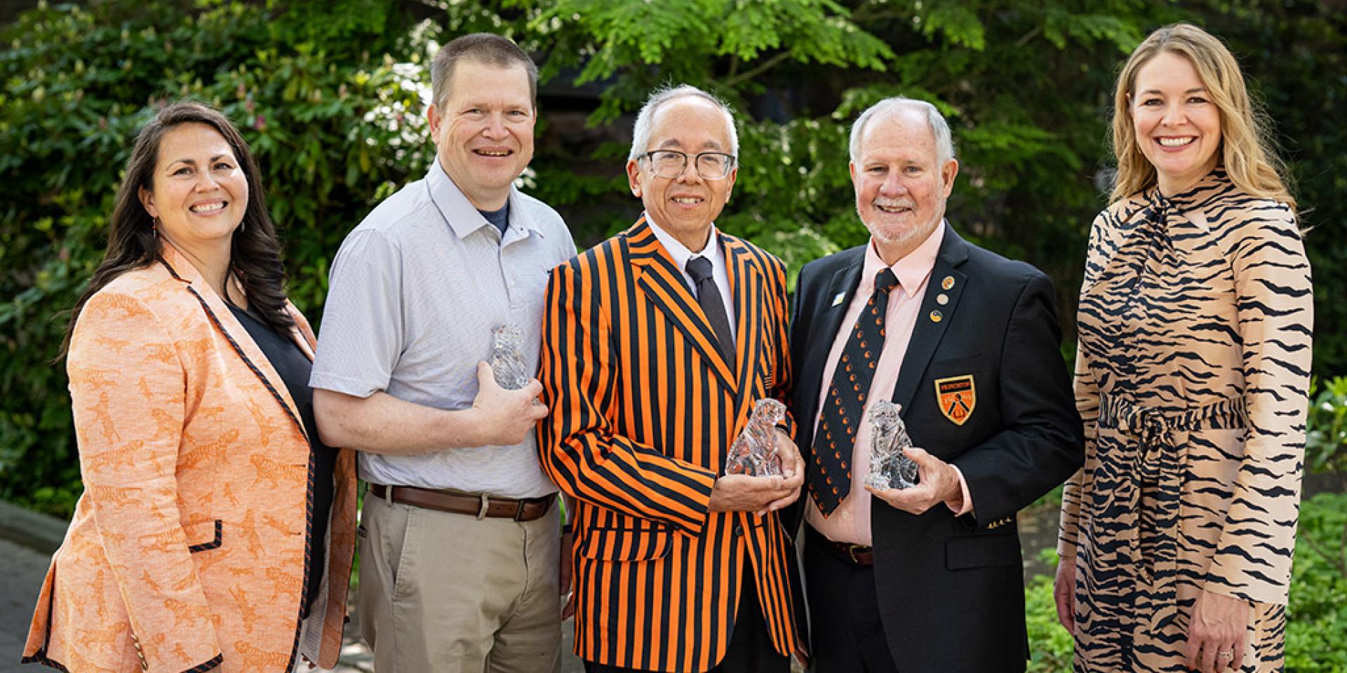 Alumni volunteer leaders pose with this year's Service Award winners