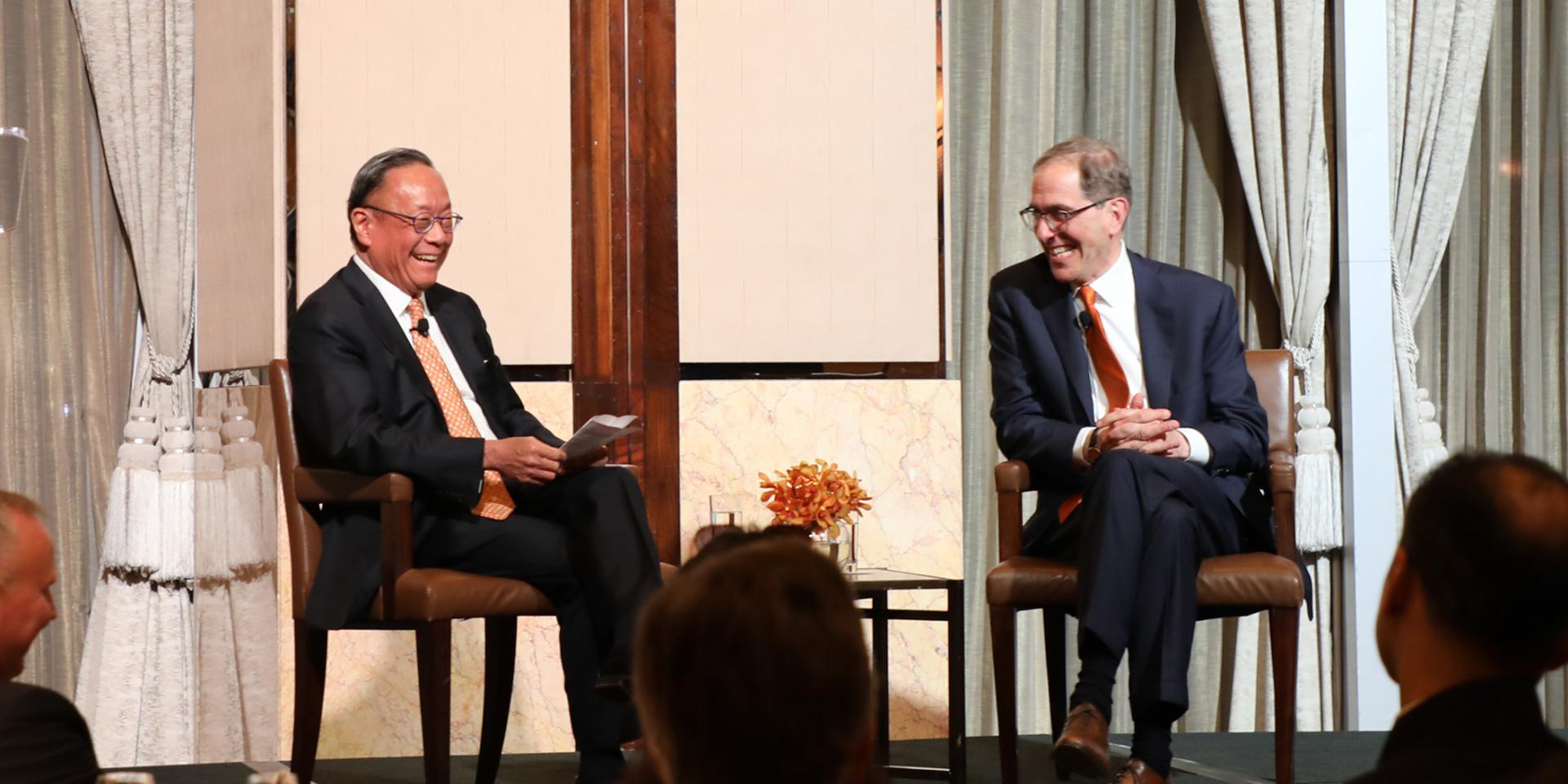 President Eisgruber and Harold Kim conversing on stage in Hong Kong