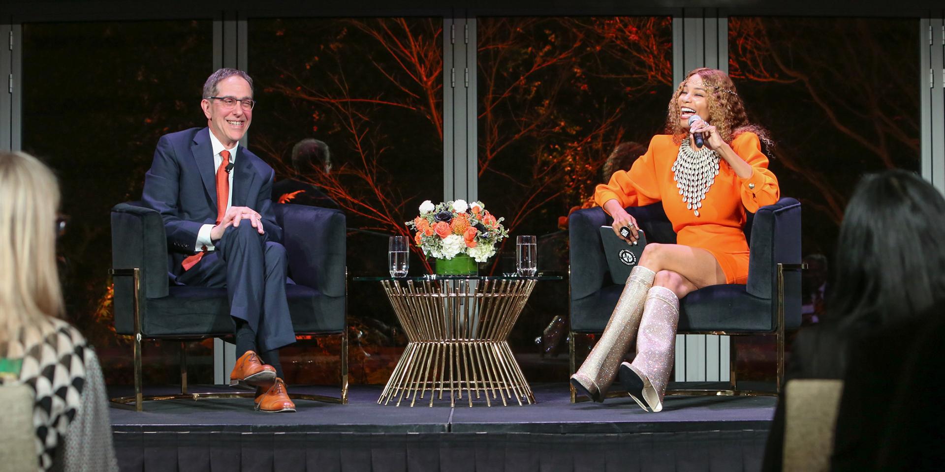President Eisgruber and Kwanza Jones on stage together in Los Angeles