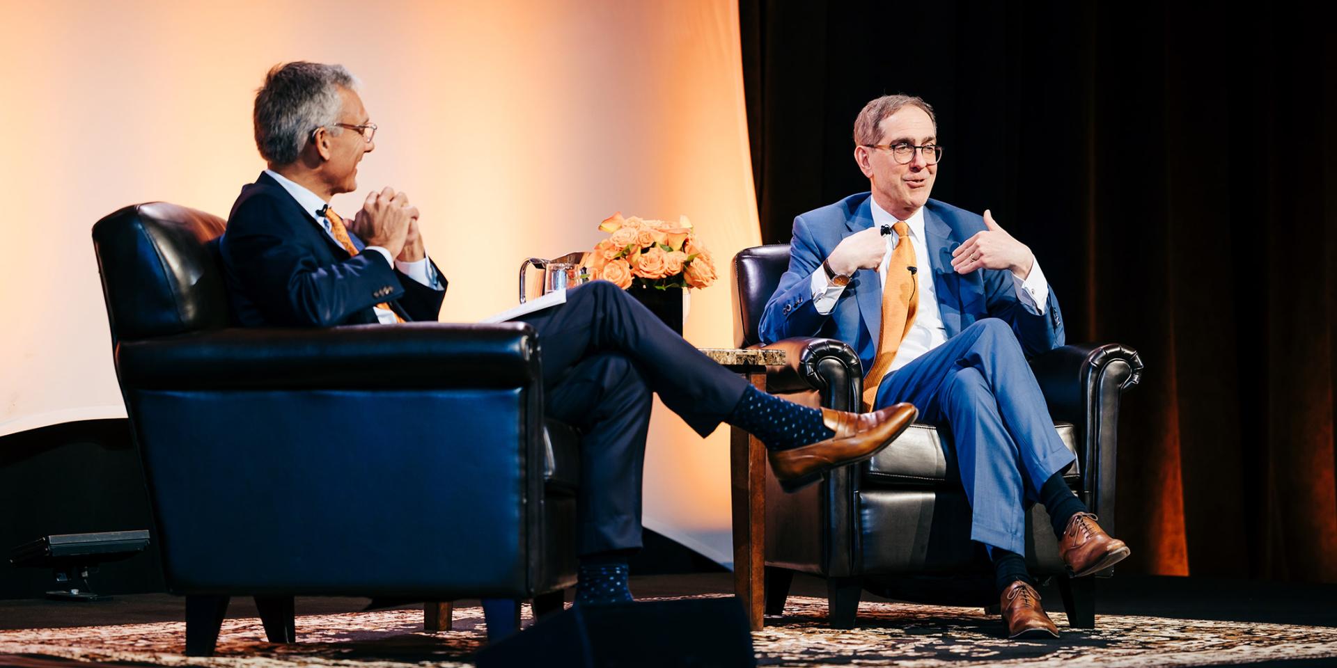 Philip Hammarskjold ’87 and President Christopher L. Eisgruber ’83 on stage together in West Palm Beach, Florida.