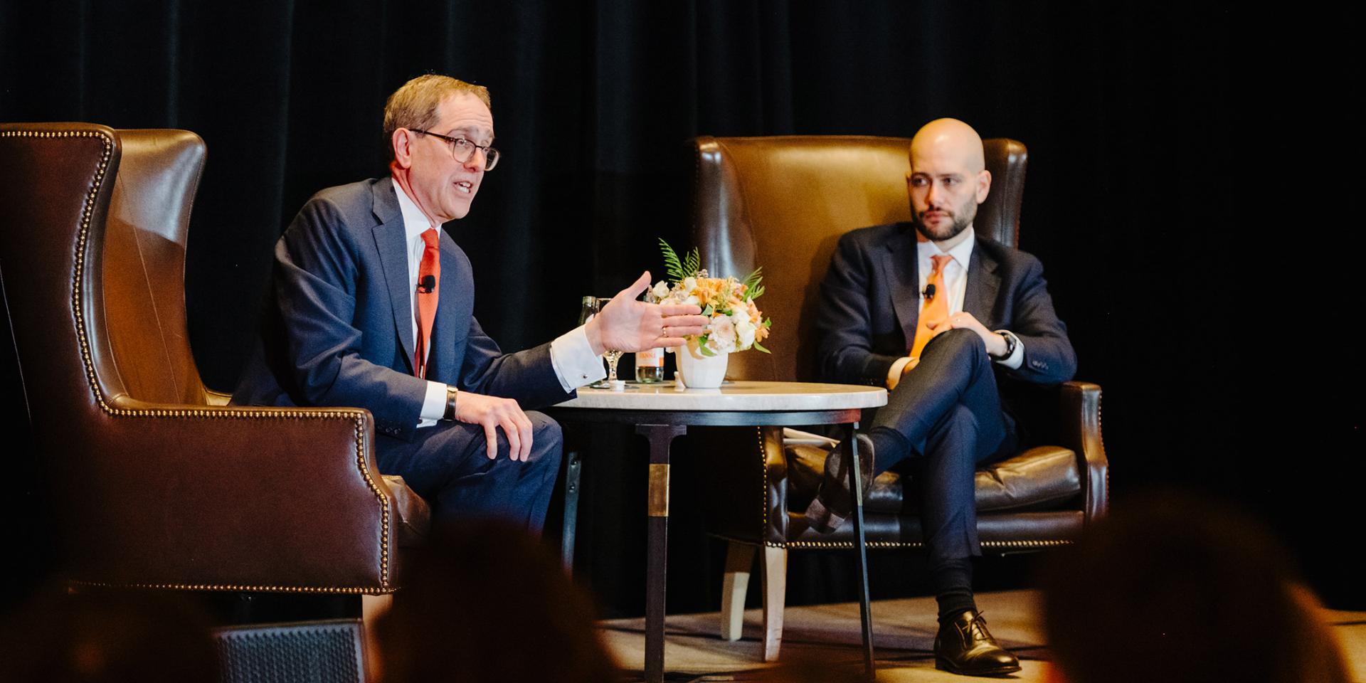 President Eisgruber seated on stage, in conversation with Gabe Debenedetti