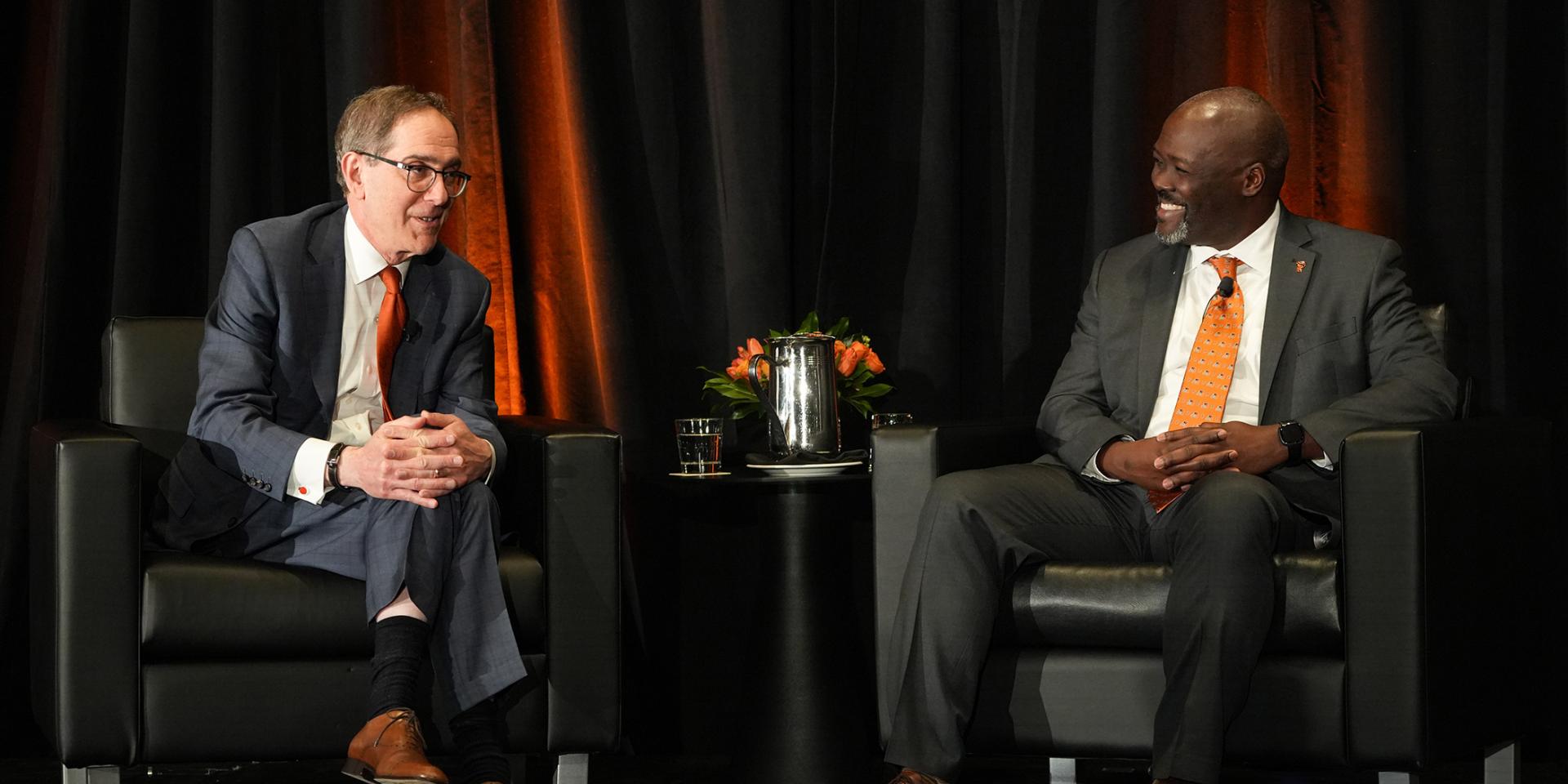 President Eisgruber on stage, seated opposite John Mack