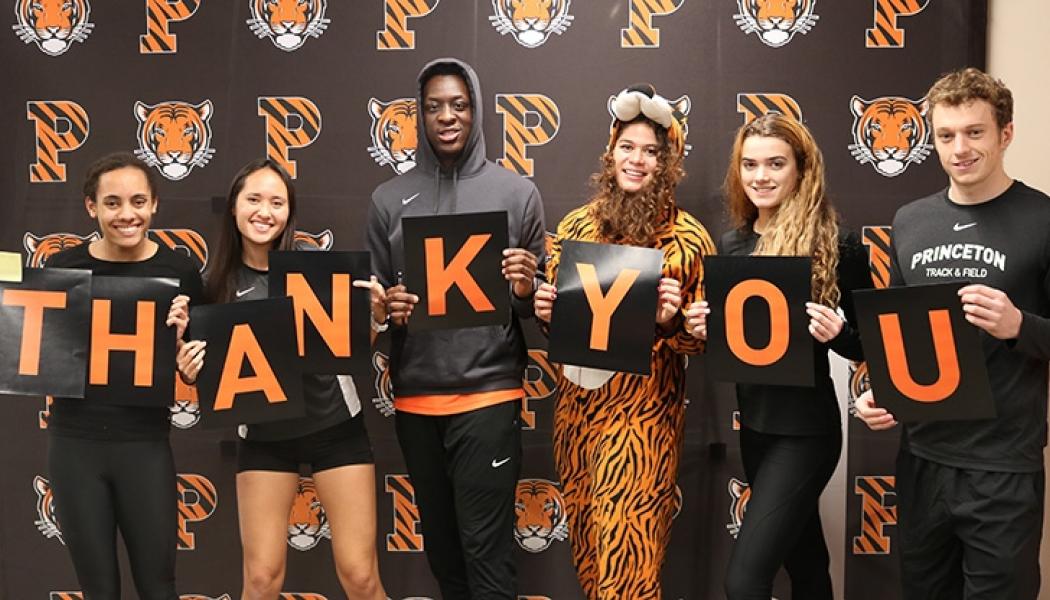 Students holding Thank You sign