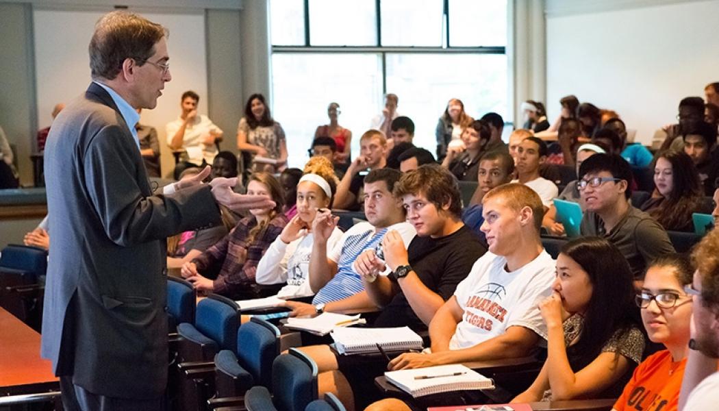 President Christopher L. Eisgruber '83 with FSI students