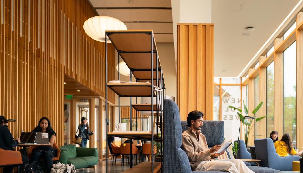 Students read quietly in one of the common spaces of Huo College