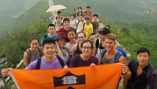 Students holding Princeton flag at the Great Wall