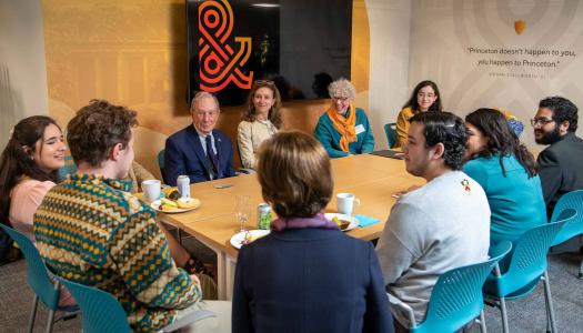 Michael R. Bloomberg and Emma Bloomberg (center) enjoy an informal roundtable conversation with a small group of students inside the center before the ceremony. Photo by Craig Warga