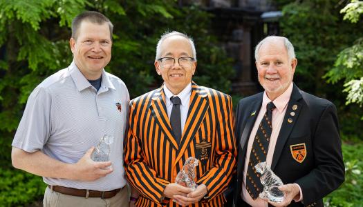 Doug Massick, Doug Chin and Bill Charrier pose with their Awards for Service to Princeton