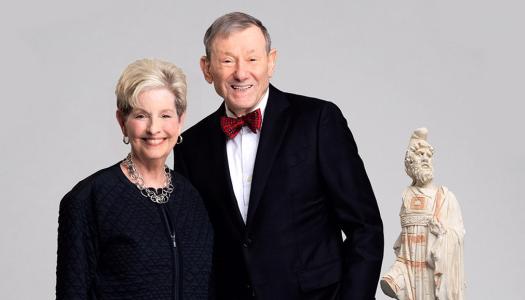 Donna and Hans Sternberg, posing nicely next to one of their sculptures