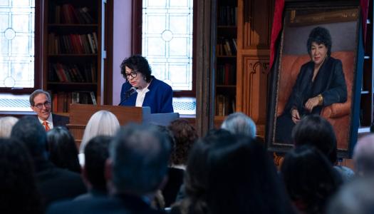 President Christopher L. Eisgruber listens as Justice Sotomayor addresses the audience at the April 11 ceremony.