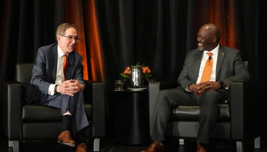 President Eisgruber on stage, seated opposite John Mack