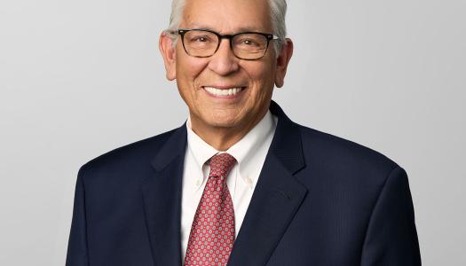 headshot of Kevin Gover wearing a suit and tie