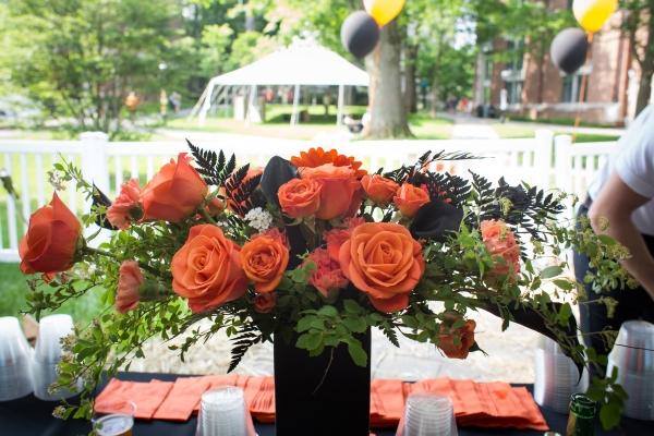 Orange fresh flowers on table. 