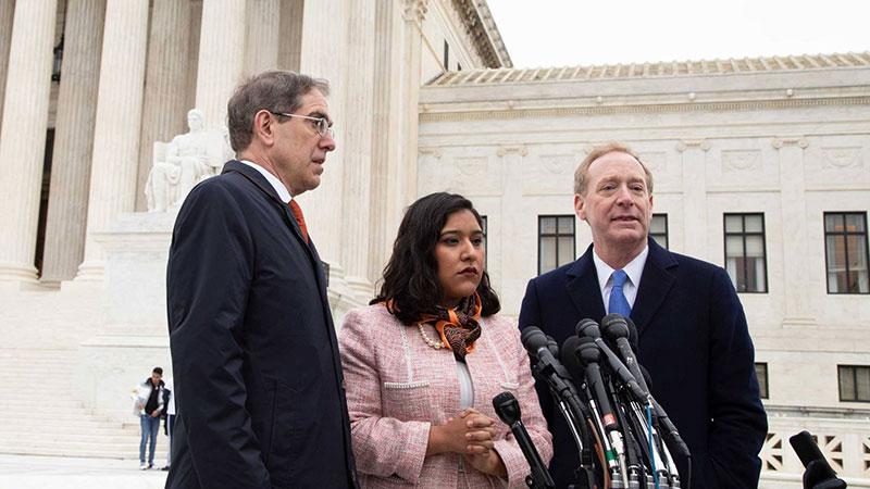 President Eisgruber, Brad Smith '81, and Maria Perales Sanchez '18 at the U.S. Supreme Court