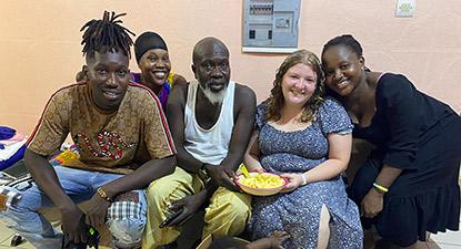 Bridge Year student Maddy Denker (second from right) with her homestay family in Senegal. 