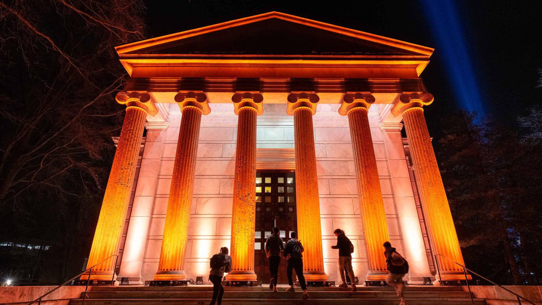 Whig Hall, lit orange at night