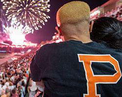 Princeton alum watching fireworks with his son