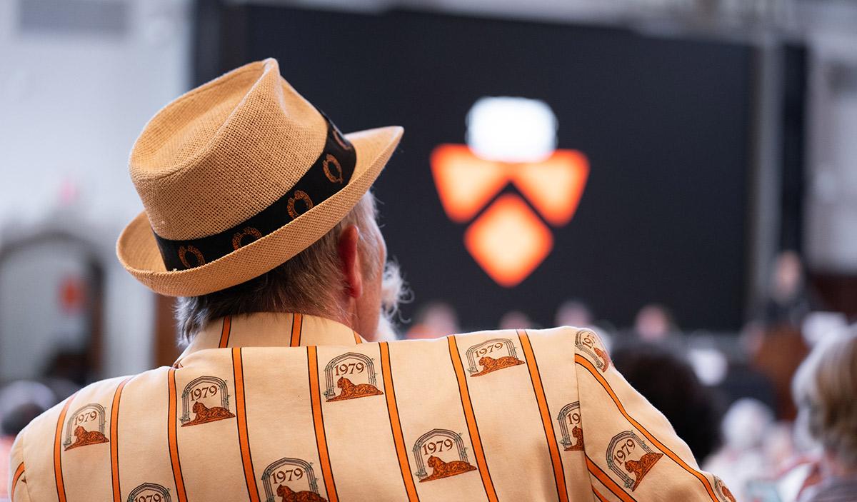 A member of the Class of 1979, wearing his Reunions jacket and hat
