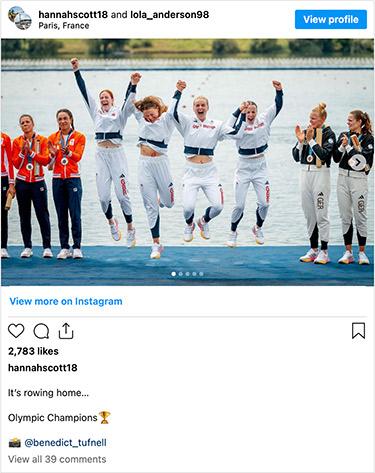 Hannah Scott and her gold-medal teammates jump in the air on the podium after receiving their medals