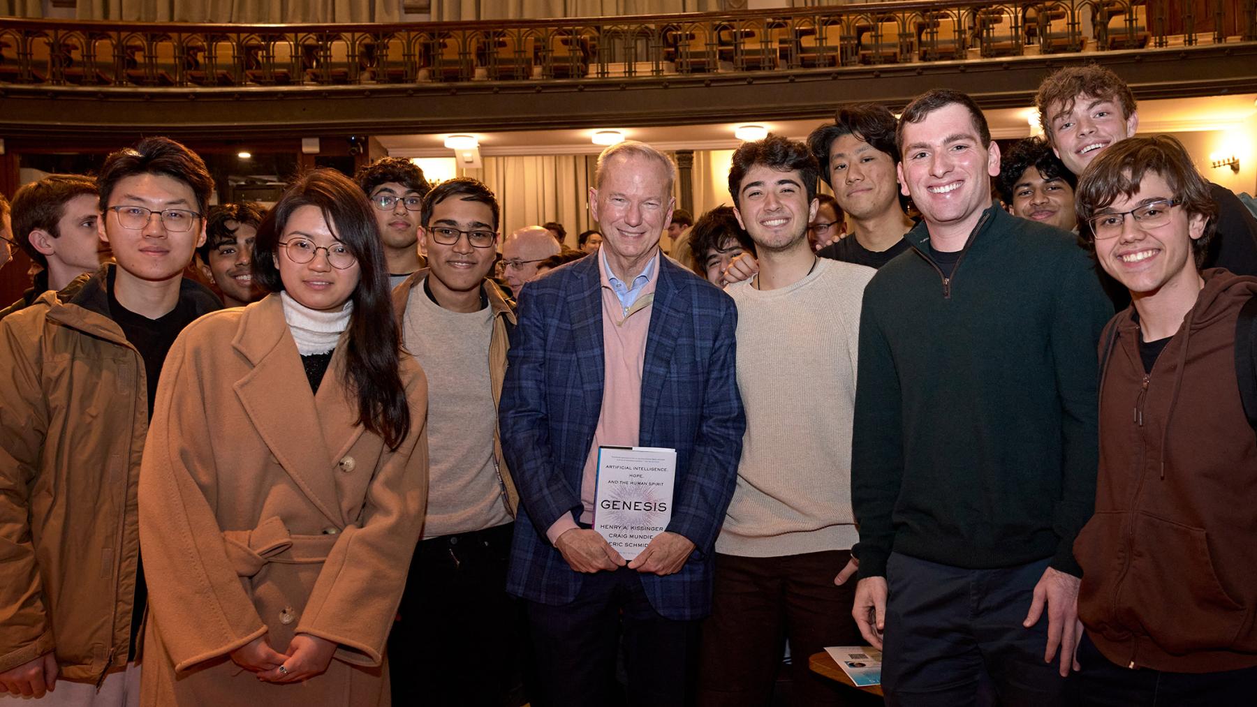 Eric Schmidt poses in the middle of Princeton students who attended his book lecture in McCosh 50