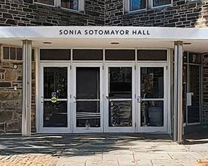 A rendering of Sonia Sotomayor Hall sign over doors at 36 University Place