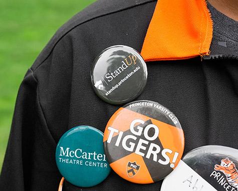 A man with a chest full of Reunions buttons