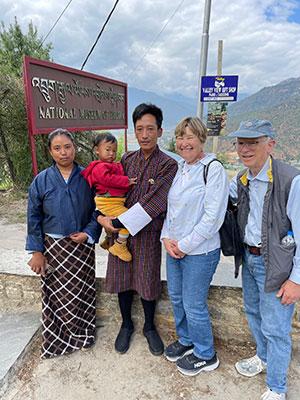 Kathy and Fred Miller with a man, woman and child in Bhutan