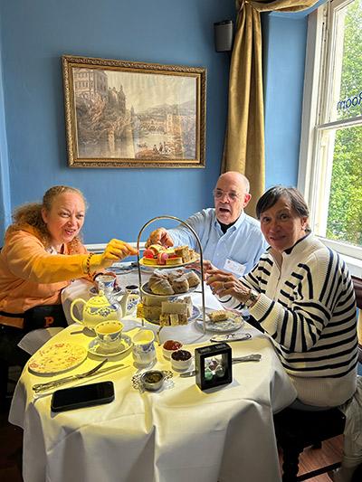 Three Princeton travelers enjoy high tea at an establishment in Bath