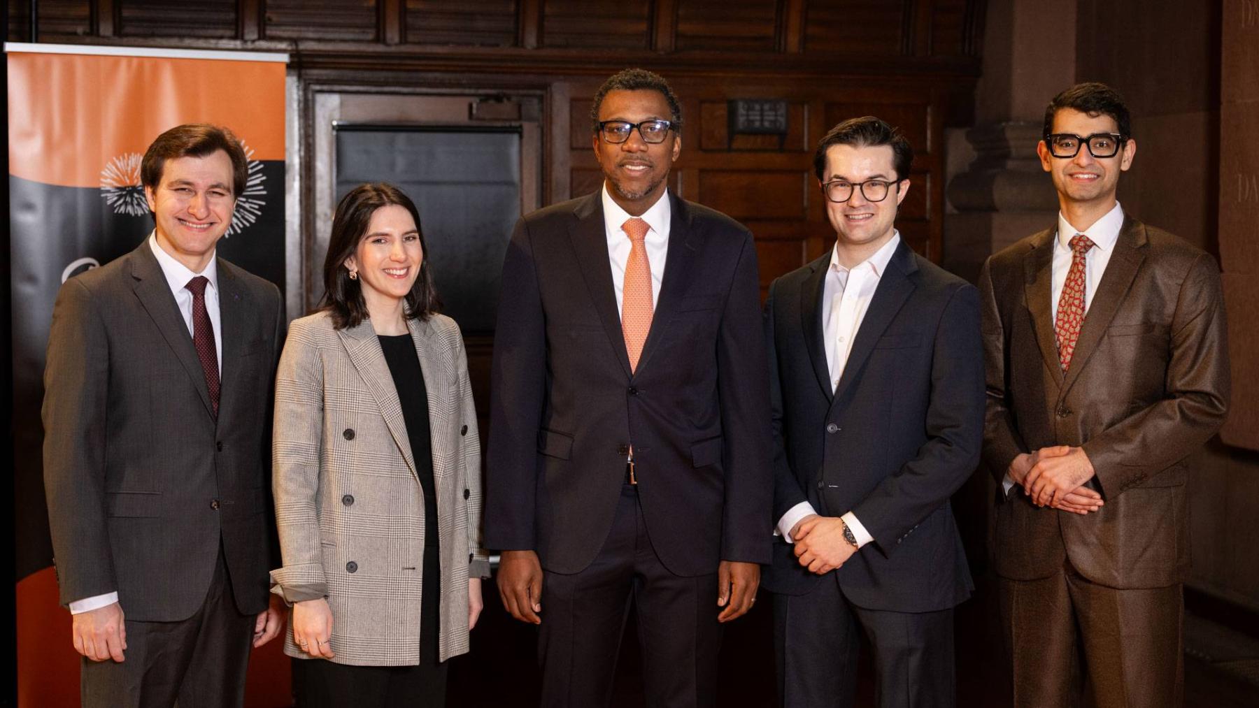 Dean of the Graduate School Rodney Priestley stands with Jacobus Fellows Philip Decker, Eliana Rozinov, Victor Geadah and Sayash Kapoor. 