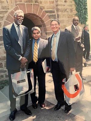 Bill Russell, another man, and Kevin Gover 