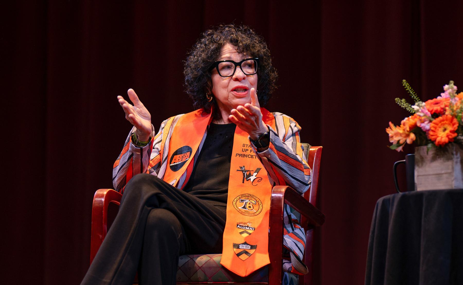 Justice Sonia Sotomayor gestures from the stage in McCarter Theatre