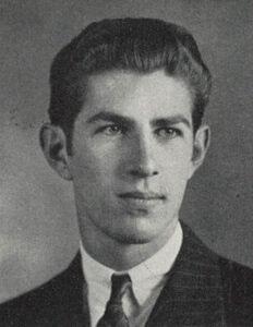 Headshot of a James Stack in a jacket and tie